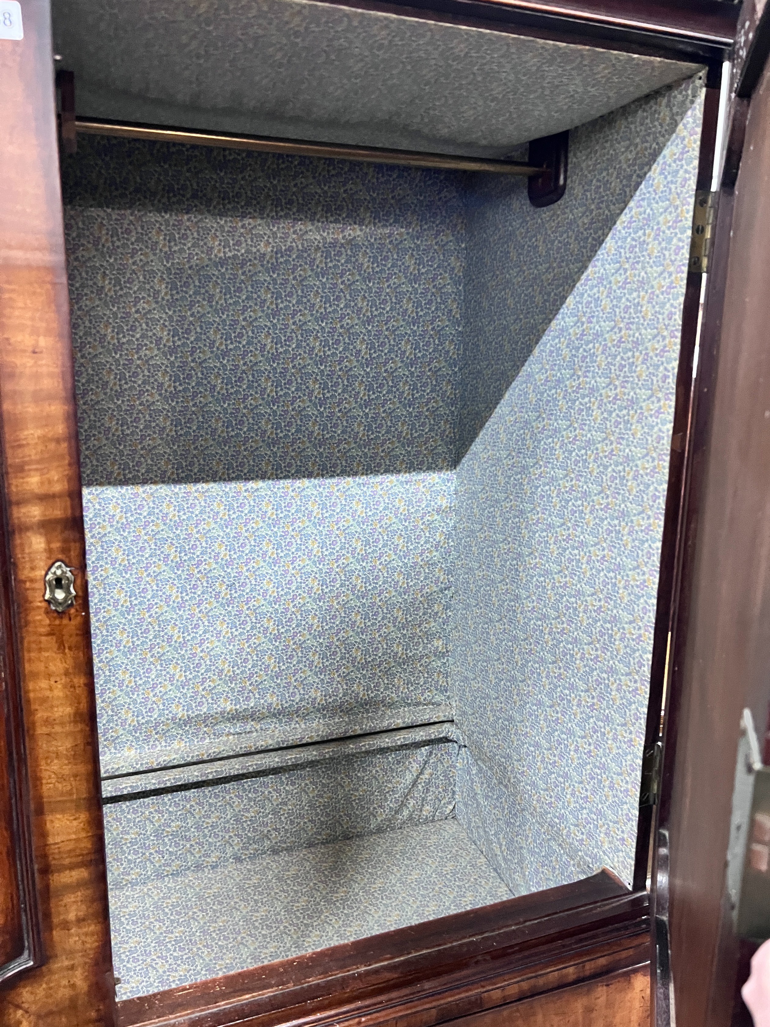 A George III mahogany linen press converted to a hanging wardrobe, length 128cm, depth 60cm, height 188cm *Please note the sale commences at 9am.